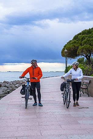 Cyclists on the seafront.