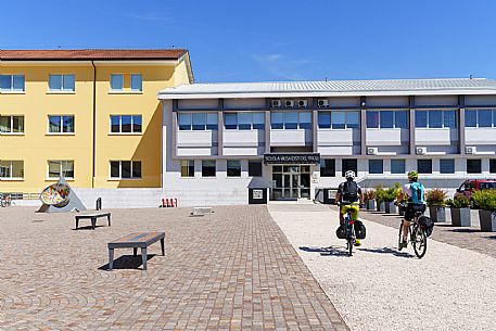 Cyclists In the courtyard Mosaic School of Friuli in Spilimbergo.