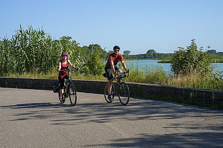 Cyclists near the Tagliamento River.