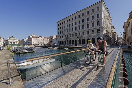 Cyclists on the Canal Grande