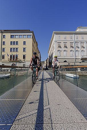 Cyclists on the Canal Grande