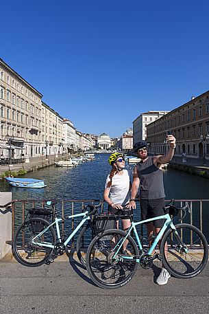 Cyclists on the Canal Grande