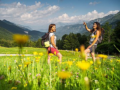 Friends trekking in the Julian Prealps Park, from Coot hut to Canin hut. Julian Prealps Natural Park. MABUNESCO