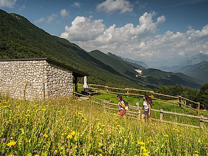 Friends trekking in the Julian Prealps Park, from Coot hut to Canin hut. Julian Prealps Natural Park. MABUNESCO