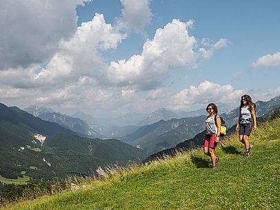 Friends trekking in the Julian Prealps Park, from Coot hut to Canin hut. Julian Prealps Natural Park. MABUNESCO