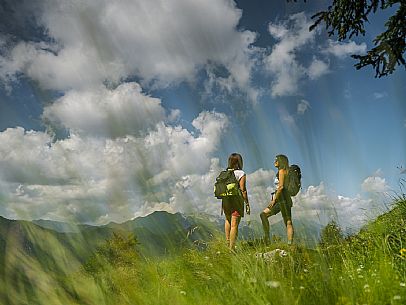 Friends trekking in the Julian Prealps Park, from Coot hut to Canin hut. Julian Prealps Natural Park. MABUNESCO