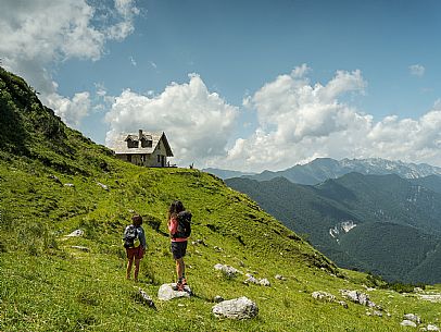 Friends trekking in the Julian Prealps Park, from Coot hut to Canin hut. Julian Prealps Natural Park. MABUNESCO