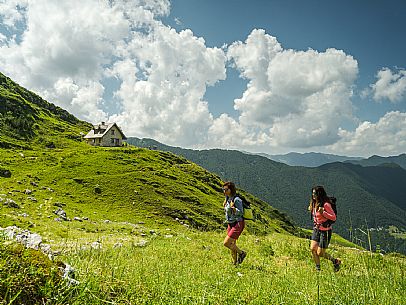 Friends trekking in the Julian Prealps Park, from Coot hut to Canin hut. Julian Prealps Natural Park. MABUNESCO