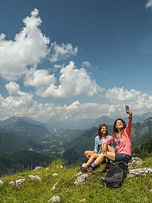 Friends trekking in the Julian Prealps Park, from Coot hut to Canin hut. Julian Prealps Natural Park. MABUNESCO