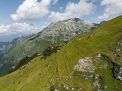 Friends trekking in the Julian Prealps Park, from Coot hut to Canin hut. Julian Prealps Natural Park. MABUNESCO