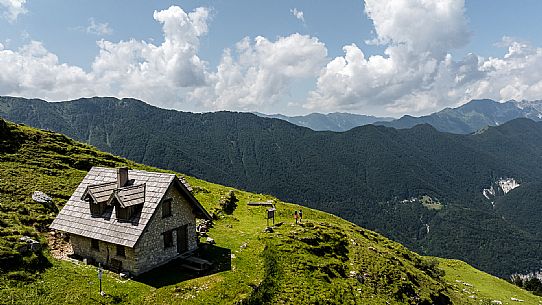 Friends trekking in the Julian Prealps Park, from Coot hut to Canin hut. Julian Prealps Natural Park. MABUNESCO