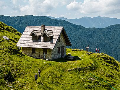 Friends trekking in the Julian Prealps Park, from Coot hut to Canin hut. Julian Prealps Natural Park. MABUNESCO