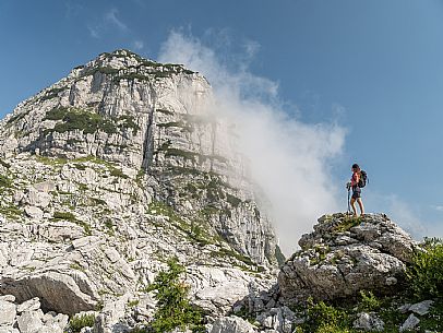 Trekking from the Celsio Gilberti Refuge, along the Bila Peč botanical path and further along the path that leads to the Marussic bivouac, on the suggestive karst plateau of Foran dal Mus. Prealpi Giulie Natural Park, MAB Unesco.