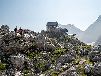 Trekking from the Celsio Gilberti Refuge, along the Bila Peč botanical path and further along the path that leads to the Marussic bivouac, on the suggestive karst plateau of Foran dal Mus. Prealpi Giulie Natural Park, MAB Unesco.