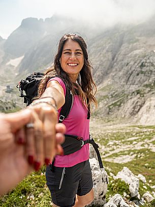 Trekking from the Celsio Gilberti Refuge, along the Bila Peč botanical path and further along the path that leads to the Marussic bivouac, on the suggestive karst plateau of Foran dal Mus. Prealpi Giulie Natural Park, MAB Unesco.