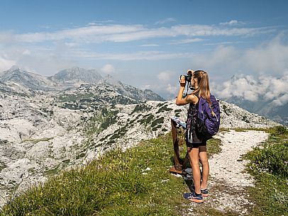 Trekking from the Celsio Gilberti Refuge, along the Bila Peč botanical path and further along the path that leads to the Marussic bivouac, on the suggestive karst plateau of Foran dal Mus. Prealpi Giulie Natural Park, MAB Unesco.