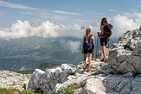 Trekking from the Celsio Gilberti Refuge, along the Bila Peč botanical path and further along the path that leads to the Marussic bivouac, on the suggestive karst plateau of Foran dal Mus. Prealpi Giulie Natural Park, MAB Unesco.