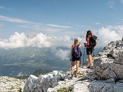 Trekking from the Celsio Gilberti Refuge, along the Bila Peč botanical path and further along the path that leads to the Marussic bivouac, on the suggestive karst plateau of Foran dal Mus. Prealpi Giulie Natural Park, MAB Unesco.