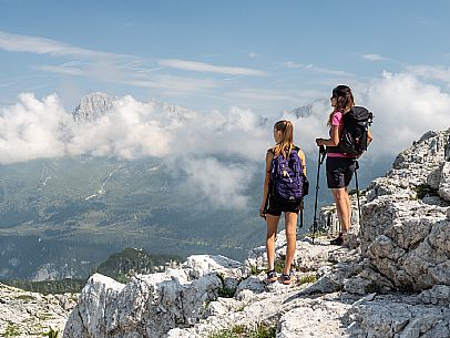 Trekking from the Celsio Gilberti Refuge, along the Bila Peč botanical path and further along the path that leads to the Marussic bivouac, on the suggestive karst plateau of Foran dal Mus. Prealpi Giulie Natural Park, MAB Unesco.