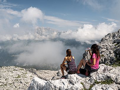 Trekking from the Celsio Gilberti Refuge, along the Bila Peč botanical path and further along the path that leads to the Marussic bivouac, on the suggestive karst plateau of Foran dal Mus. Prealpi Giulie Natural Park, MAB Unesco.