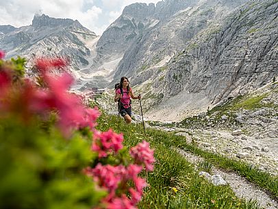 Trekking from the Celsio Gilberti Refuge, along the Bila Peč botanical path and further along the path that leads to the Marussic bivouac, on the suggestive karst plateau of Foran dal Mus. Prealpi Giulie Natural Park, MAB Unesco.