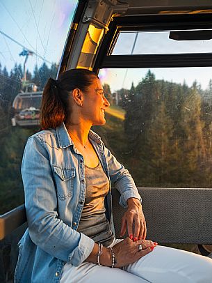 Lift up to Monte Santo di Lussari, enjoying the summer night opening of the telecabine. To enjoy the beautiful view of the Julian Mountains at sunset and the village lit up at night.