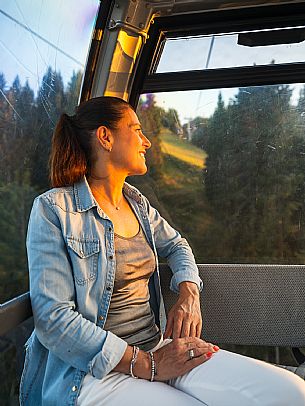 Lift up to Monte Santo di Lussari, enjoying the summer night opening of the telecabine. To enjoy the beautiful view of the Julian Mountains at sunset and the village lit up at night.