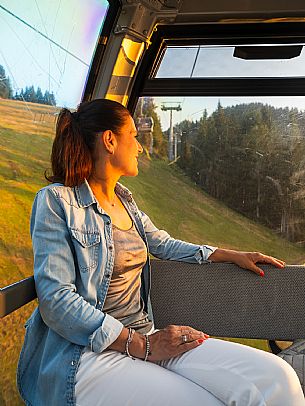 Lift up to Monte Santo di Lussari, enjoying the summer night opening of the telecabine. To enjoy the beautiful view of the Julian Mountains at sunset and the village lit up at night.