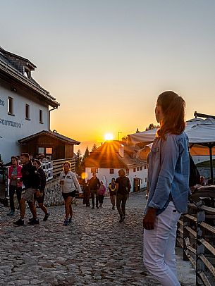 Lift up to Monte Santo di Lussari, enjoying the summer night opening of the telecabine. To enjoy the beautiful view of the Julian Mountains at sunset and the village lit up at night.