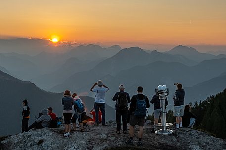 Lift up to Monte Santo di Lussari, enjoying the summer night opening of the telecabine. To enjoy the beautiful view of the Julian Mountains at sunset and the village lit up at night.