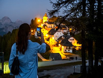 Lift up to Monte Santo di Lussari, enjoying the summer night opening of the telecabine. To enjoy the beautiful view of the Julian Mountains at sunset and the village lit up at night.