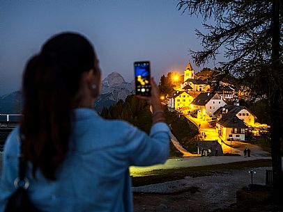 Lift up to Monte Santo di Lussari, enjoying the summer night opening of the telecabine. To enjoy the beautiful view of the Julian Mountains at sunset and the village lit up at night.