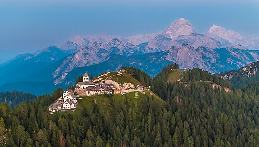 Lift up to Monte Santo di Lussari, enjoying the summer night opening of the telecabine. To enjoy the beautiful view of the Julian Mountains at sunset and the village lit up at night.