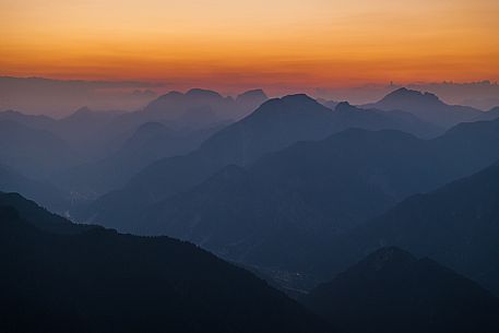 Lift up to Monte Santo di Lussari, enjoying the summer night opening of the telecabine. To enjoy the beautiful view of the Julian Mountains at sunset and the village lit up at night.