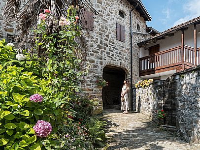 Walking in the Friulian Dolomites, in the villages of Frisanco and Poffabro, considered among the most beautiful villages in Italy