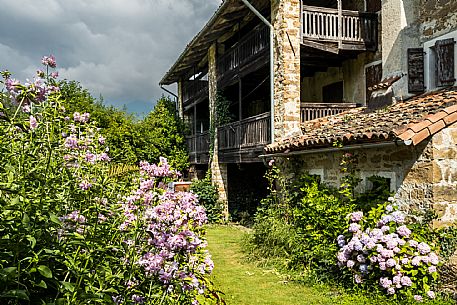 Walking in the Friulian Dolomites, in the villages of Frisanco and Poffabro, considered among the most beautiful villages in Italy