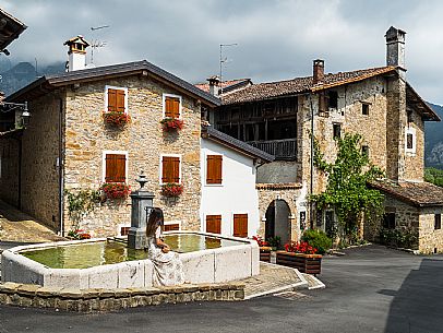 Walking in the Friulian Dolomites, in the villages of Frisanco and Poffabro, considered among the most beautiful villages in Italy