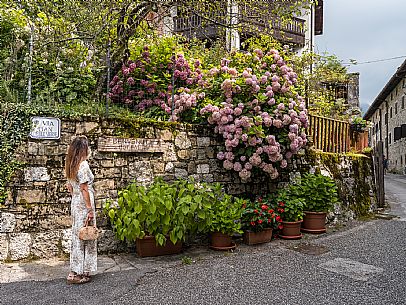 Walking in the Friulian Dolomites, in the villages of Frisanco and Poffabro, considered among the most beautiful villages in Italy