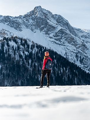 Snowshoe walk in Sauris di Sopra, with the iconic Bivera mountain in the background