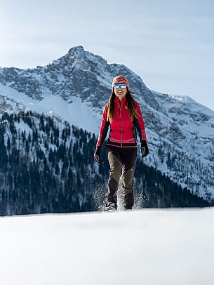 Snowshoe walk in Sauris di Sopra, with the iconic Bivera mountain in the background