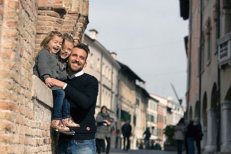 Family with kids at Pordenone center.