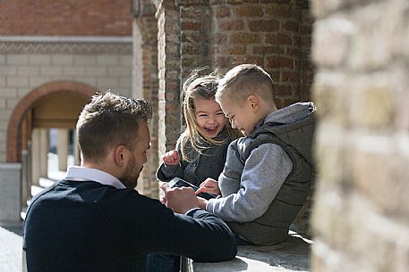 Family with kids at Pordenone center.