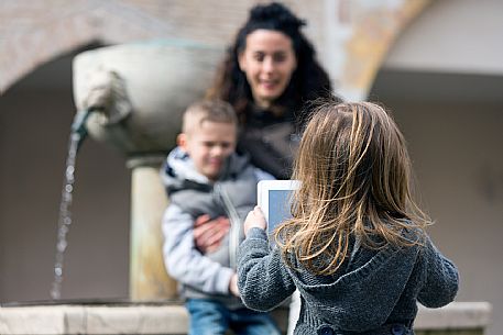 Family with kids at Pordenone center.