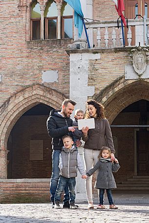 Family with kids at Pordenone center.