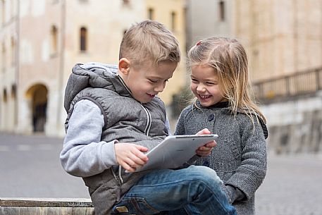 Family with kids at Pordenone center.