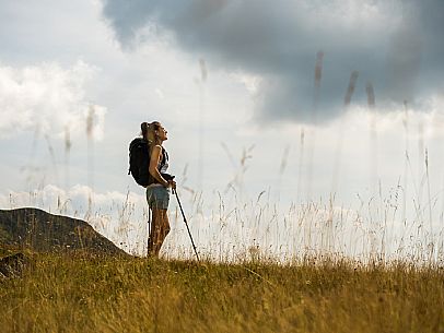 Trekking along the path to the panoramic peak of Monte Crostis, Panoramica delle Vette, Ravascletto, Carnia Trekking along the path to the panoramic peak of Monte Crostis, Panoramica delle Vette, Ravascletto, Carnia