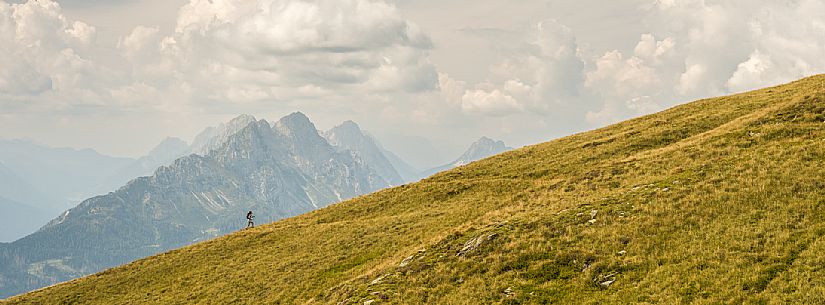 Trekking along the path to the panoramic peak of Monte Crostis, Panoramica delle Vette, Ravascletto, Carnia Trekking along the path to the panoramic peak of Monte Crostis, Panoramica delle Vette, Ravascletto, Carnia