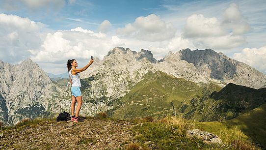 Trekking along the path to the panoramic peak of Monte Crostis, Panoramica delle Vette, Ravascletto, Carnia.
Trekking along the path to the panoramic peak of Monte Crostis, Panoramica delle Vette, Ravascletto, Carnia.