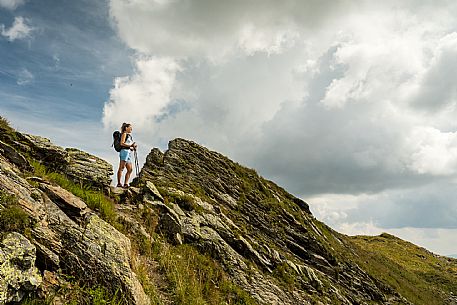 Trekking along the path to the panoramic peak of Monte Crostis, Panoramica delle Vette, Ravascletto, Carnia.
Trekking along the path to the panoramic peak of Monte Crostis, Panoramica delle Vette, Ravascletto, Carnia.