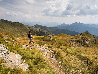 Trekking along the path to the panoramic peak of Monte Crostis, Panoramica delle Vette, Ravascletto, Carnia Trekking along the path to the panoramic peak of Monte Crostis, Panoramica delle Vette, Ravascletto, Carnia